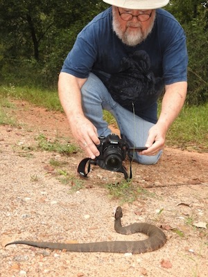 Michael Smith with cottonmouth snake