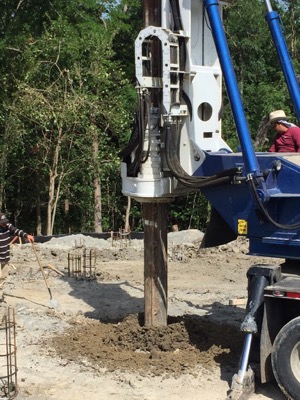 Ferrier Custom Home drilling pier and beam foundation