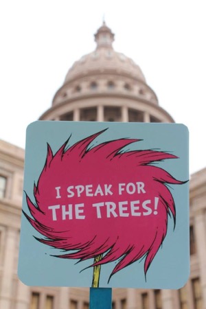 Tree supporters sign at the Capitol