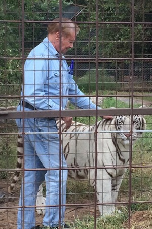 Louis Dorfman with white tiger at IEAS