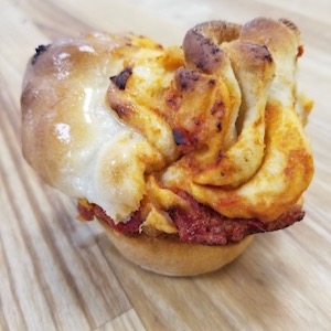 Pizza cruffin at Planted Bakery