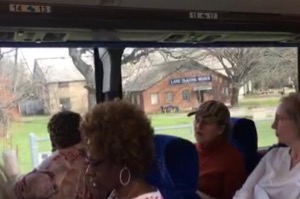 Toxic Bus Tour passes Lane Plating